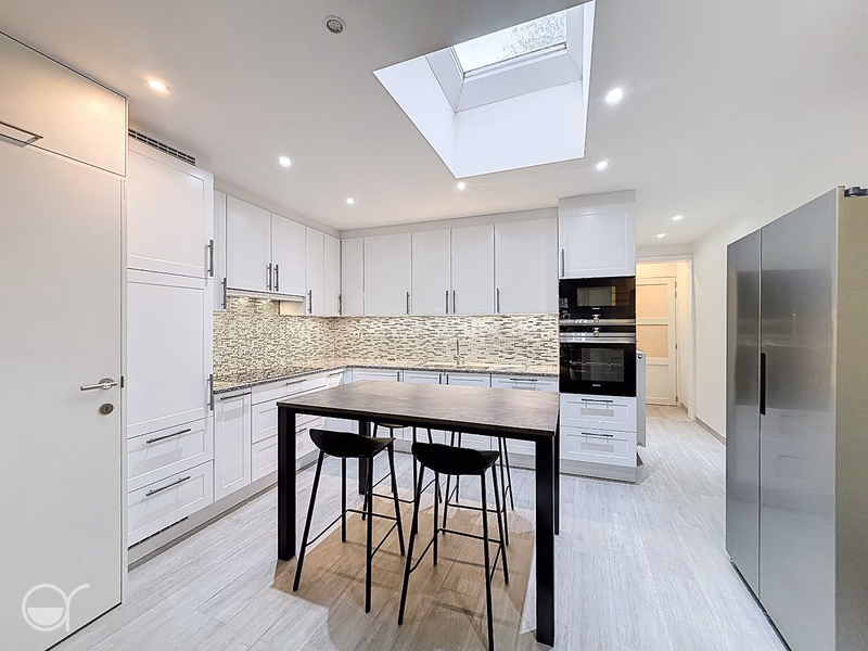 Rustig gelegen rijwoning met 4 slaapkamers en een koertje - 4